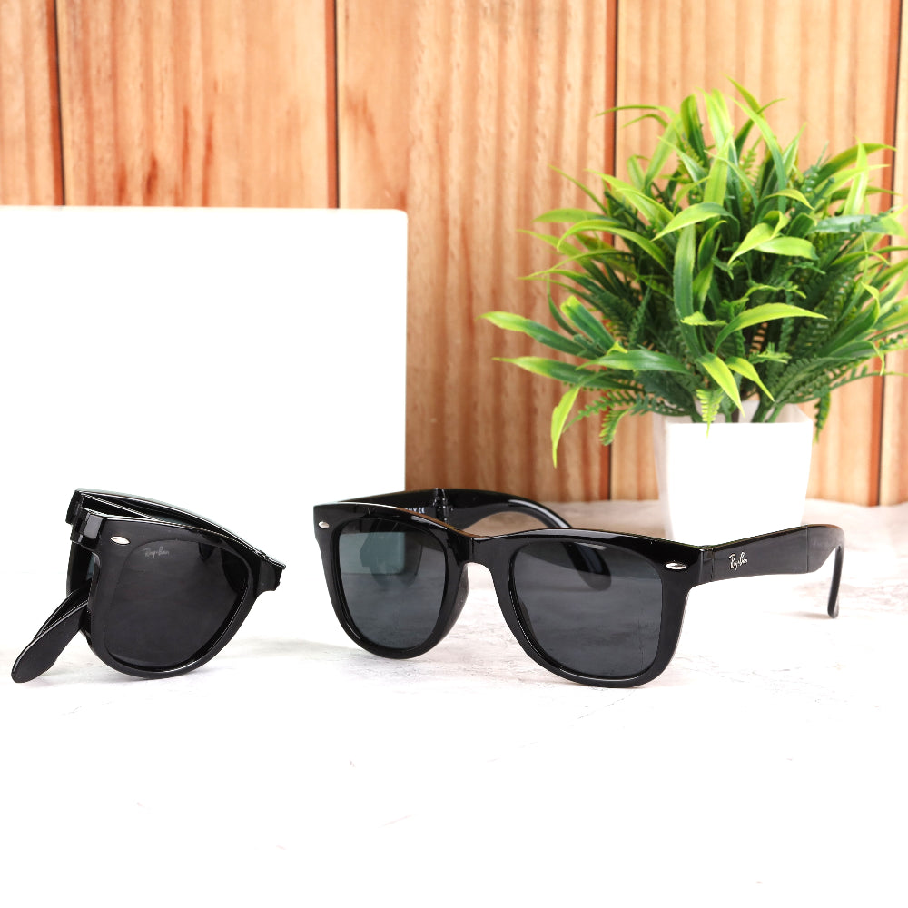 Classic Square 4105 folding sunglasses with shining black frame and black UV 400 lenses. Unisex, glare-reducing design ideal for all face shapes. Available now at JUO INDIA.